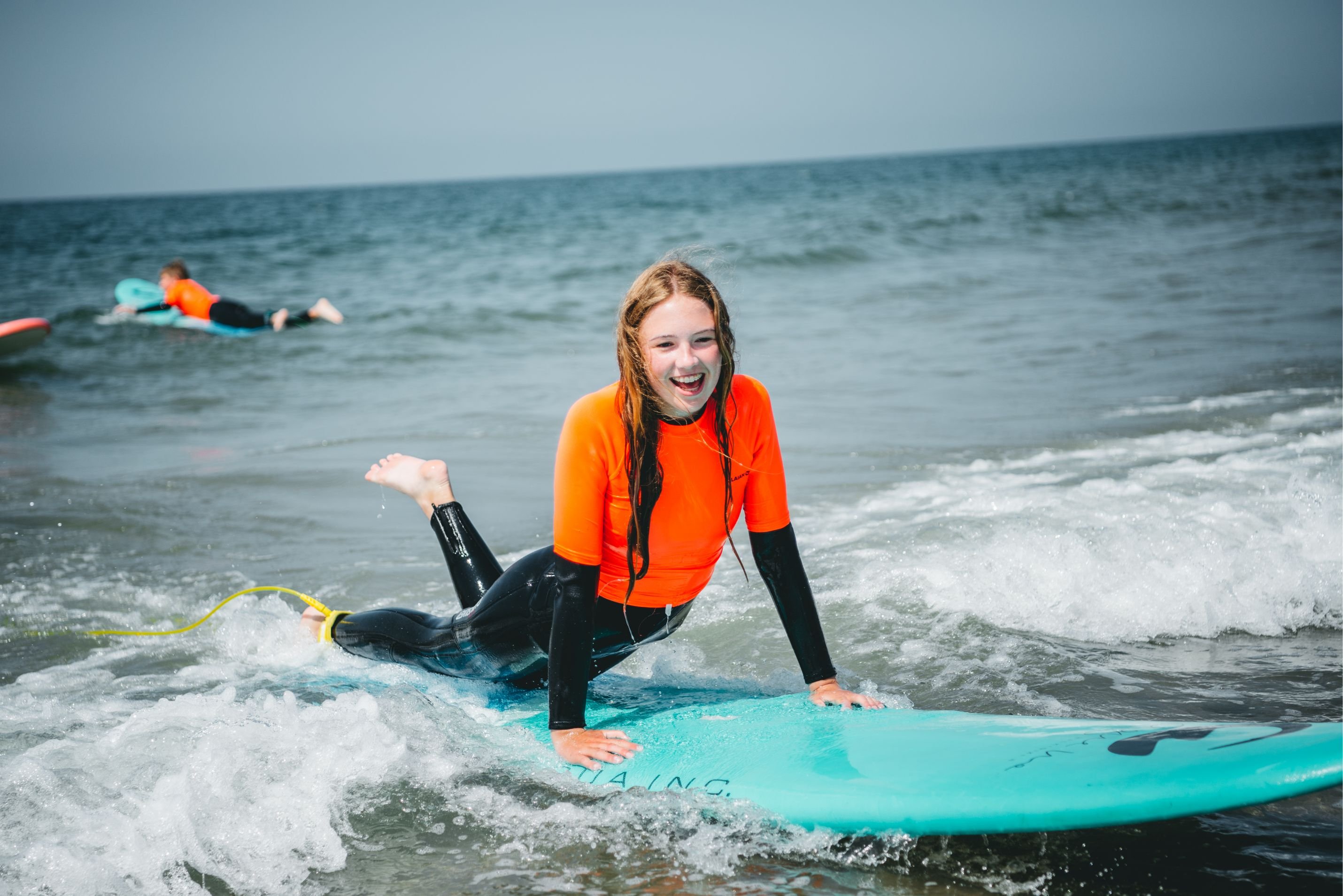 DJUS Quiksilver surfschool strand surflessen